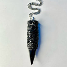 Container Necklace Pendant Stash with all an all black rhinestone covered base with black crushed crystal accents and a matching black tip closed full pendant.