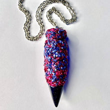 Custom Secret Compartment Jewelry Stash Necklace with a mix of Magenta and Periwinkle crushed crystals for a marbled look and tipped with a shimmering Blue Sandstone point shown as a closed, full pendant without the spoon inside the lid option.