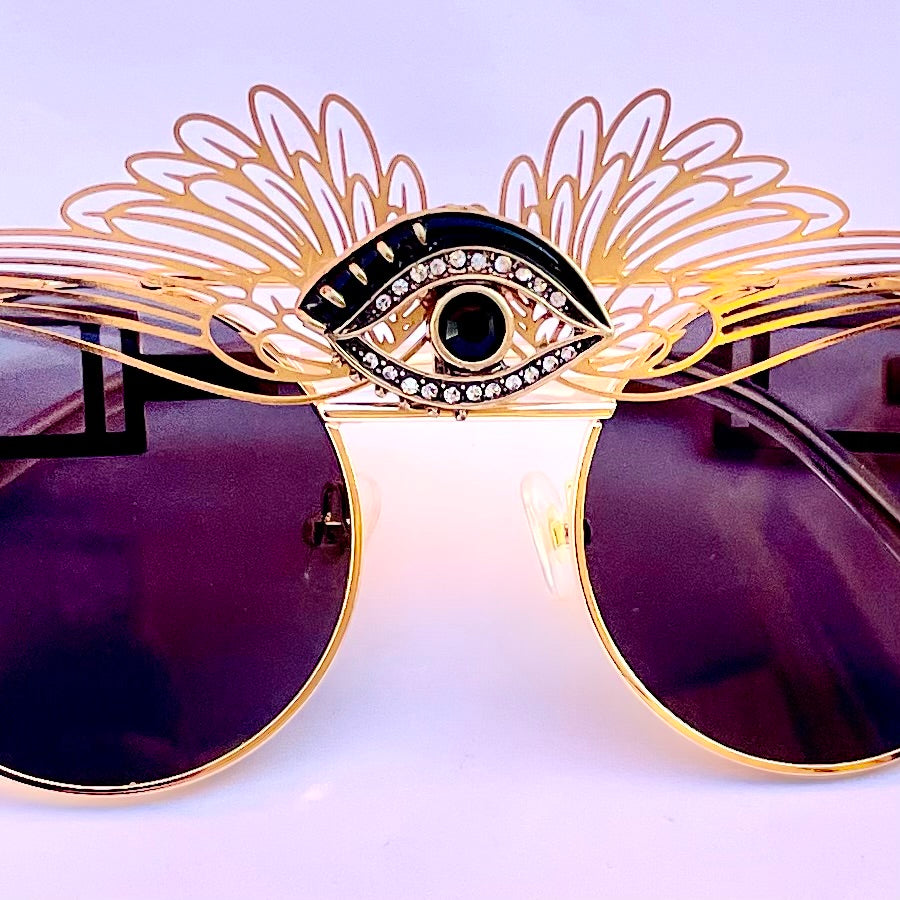 Winged sunglasses discount