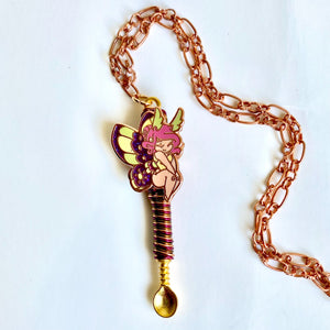 Custom Fairy Absinthe Spoon Necklace with a small colorful fairy lady centerpiece charm on a medium scoop size gold spoon base with complimenting wire wrapping details.